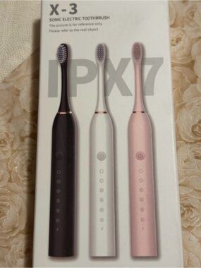X-3 Sonic Electric Toothbrush - comes in White or Black.